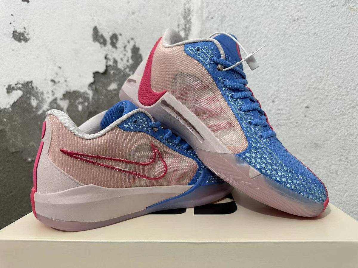 Nike Kobe 5 Protro Basketball Shoes in Blue and Pink - product image from the listing.