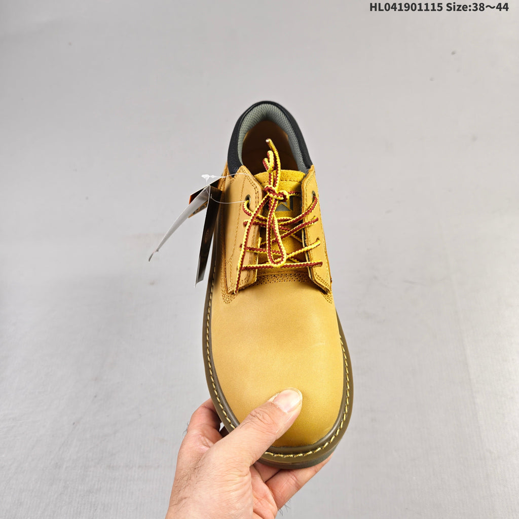 CAT Low-Top Lace-Up Work Boots in Honey in Yellow - product image from the listing.
