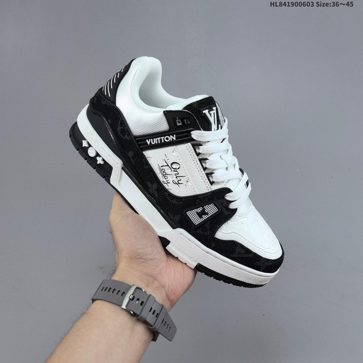 Louis Vuitton Low-Top Sneakers in Black or in Blue and White - product image from the listing.