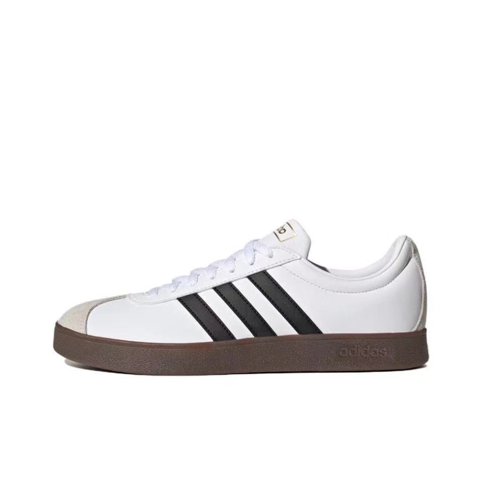 Adidas ID6015 Low-Top Sneakers in White and Black - product image from the listing.