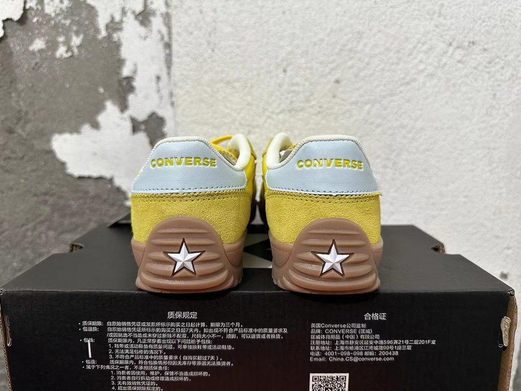 Yellow Converse Training Shoes - product image from the listing.