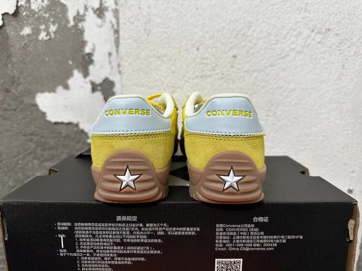 Yellow Converse Training Shoes - product image from the listing.