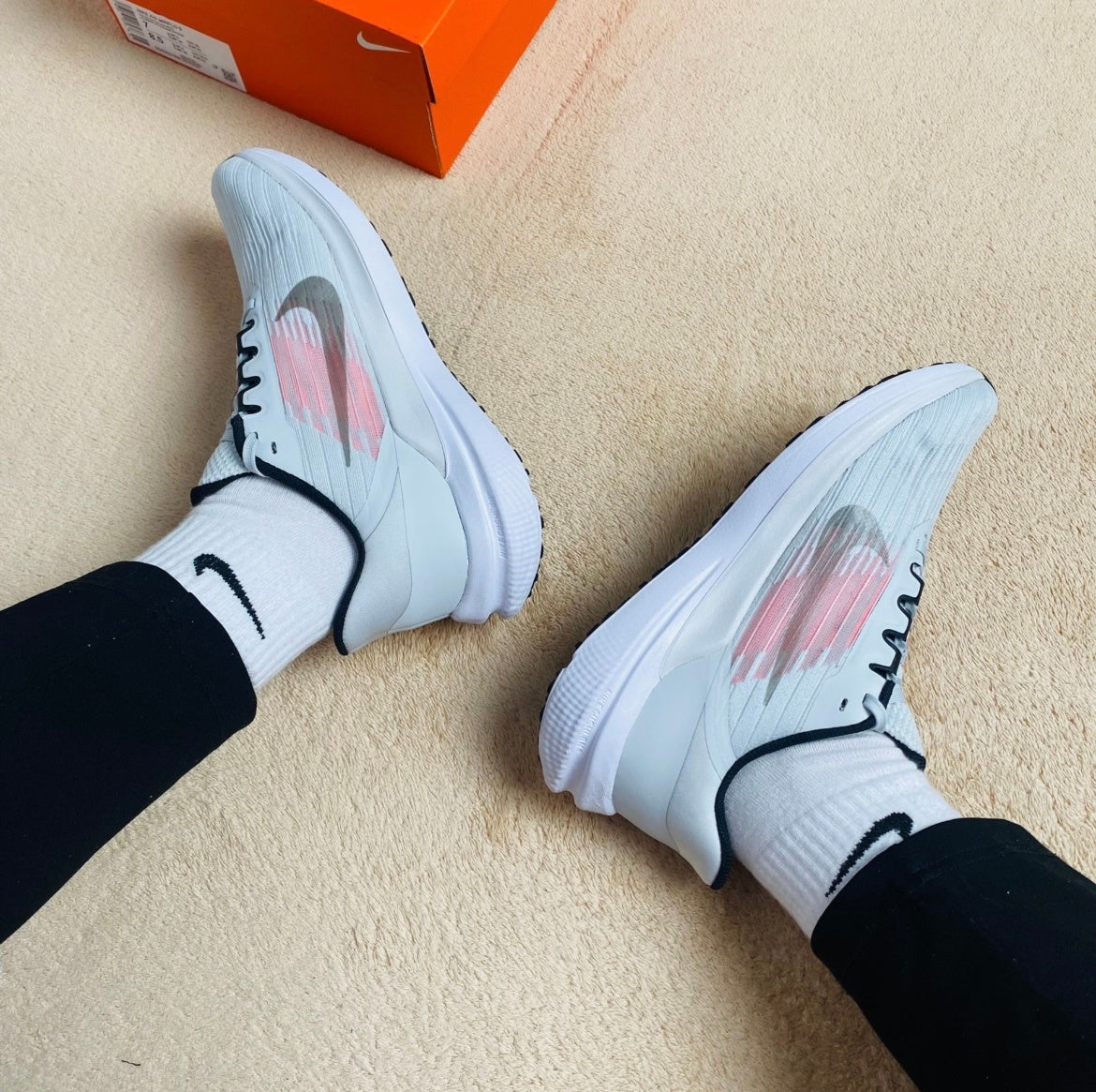 Nike Air Winflo 9 Running Shoes in White and Pink DD6203-009 - product image from the listing.