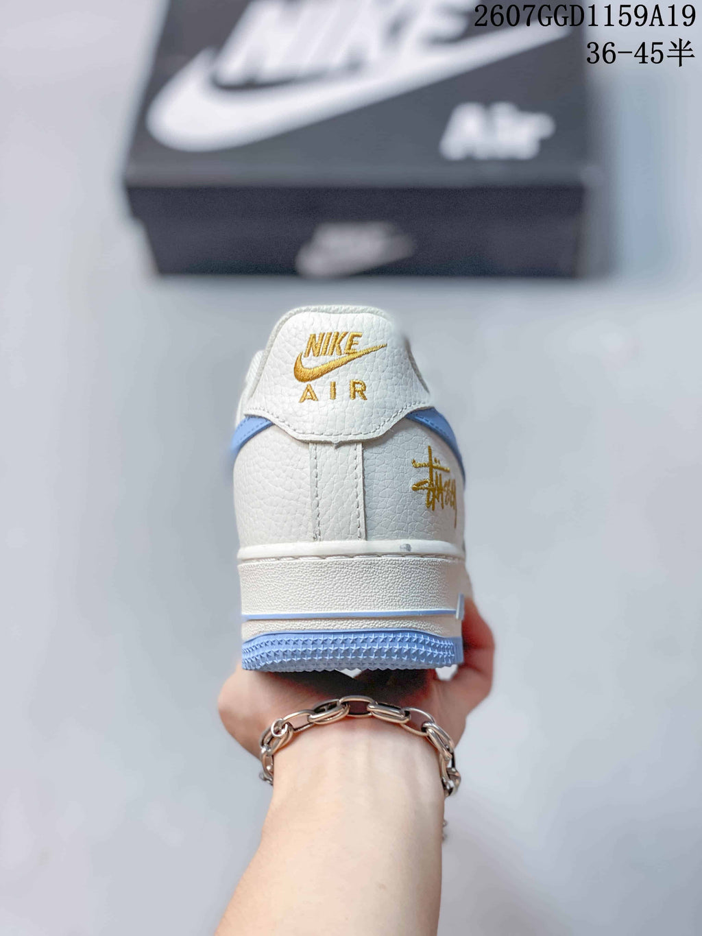 Nike Air Force 1 '07 Low Sneakers in White Light Blue - product image from the listing.