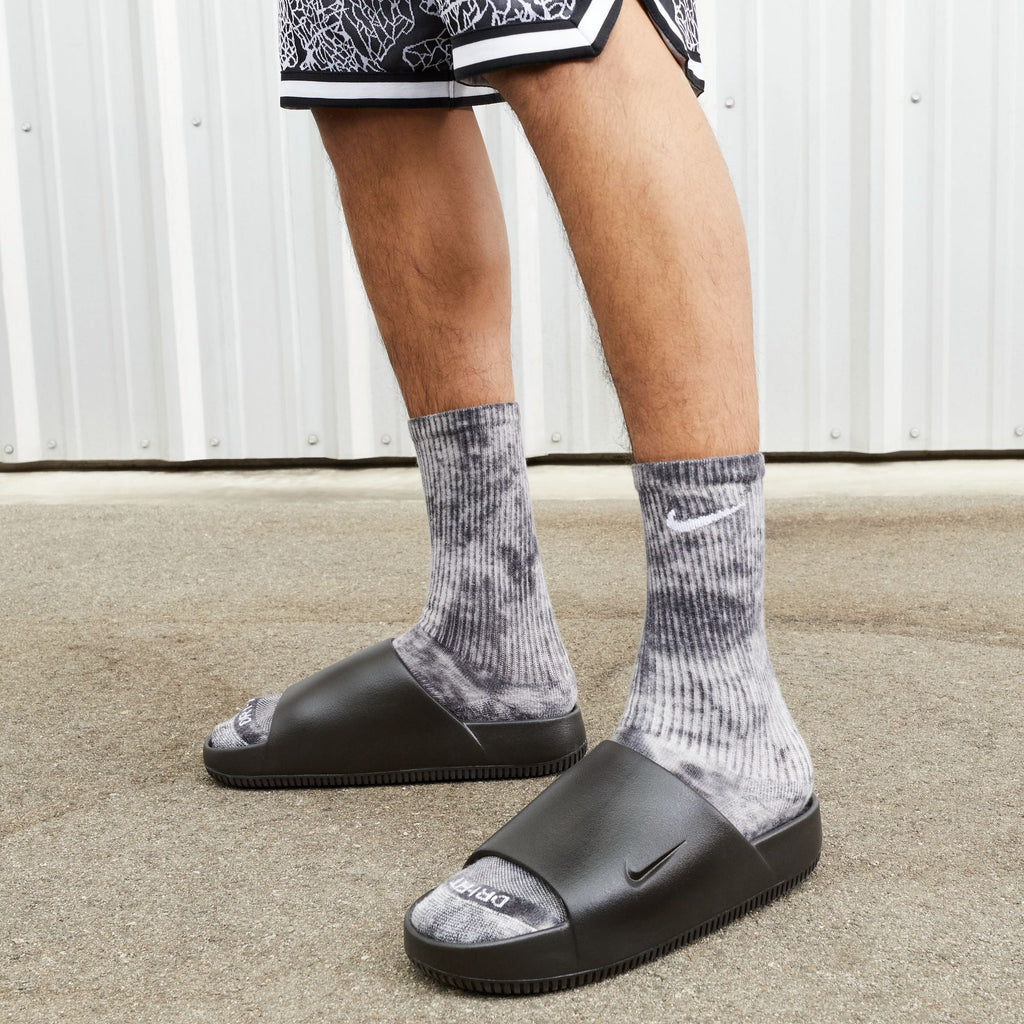 Men's Nike Calm Slide - Black - product image from the listing.