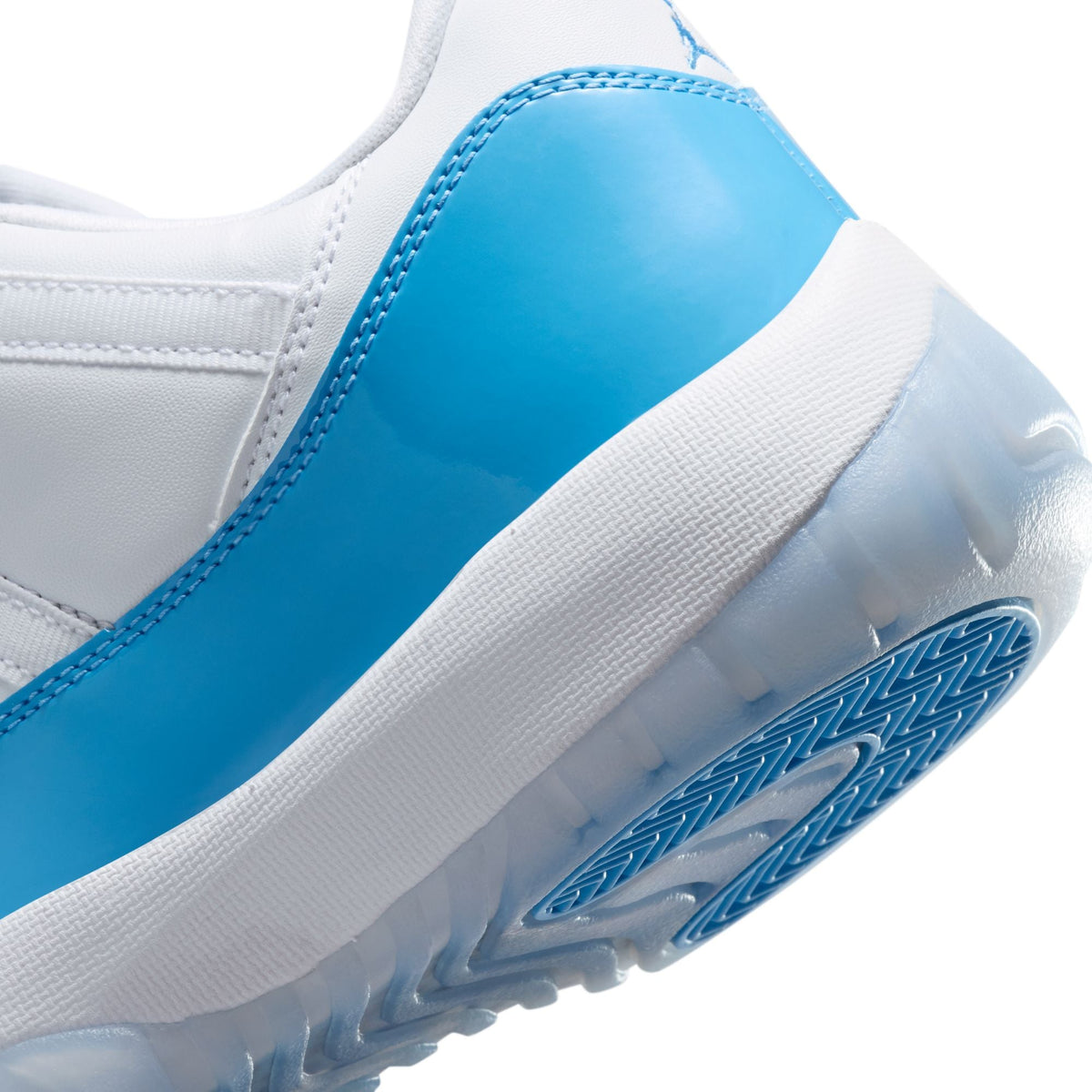 Air Jordan 11 Retro Low - WHITE/UNIVERSITY BLUE-BLACK for Men - product image from the listing.
