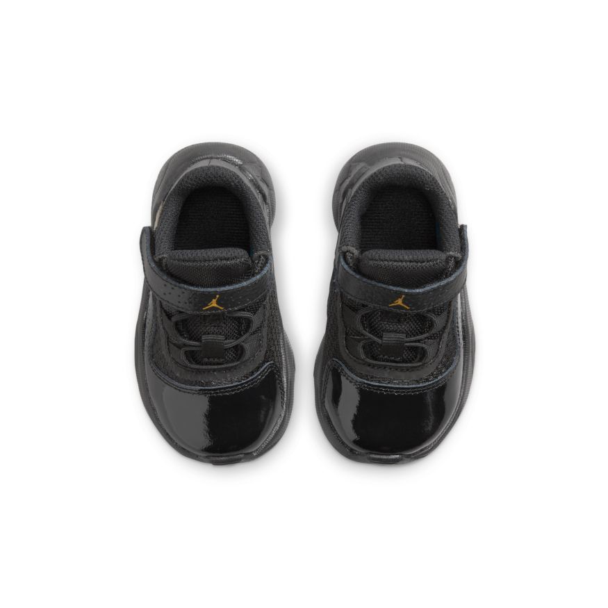 Jordan 11 Cmft Low (TD) in BLACK/METALLIC GOLD - product image from the listing.