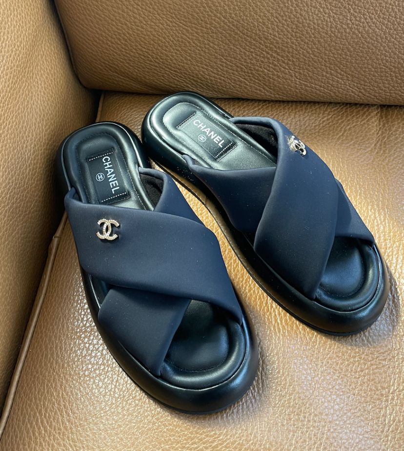 Chanel Crossover Mule Slides in Black - product image from the listing.