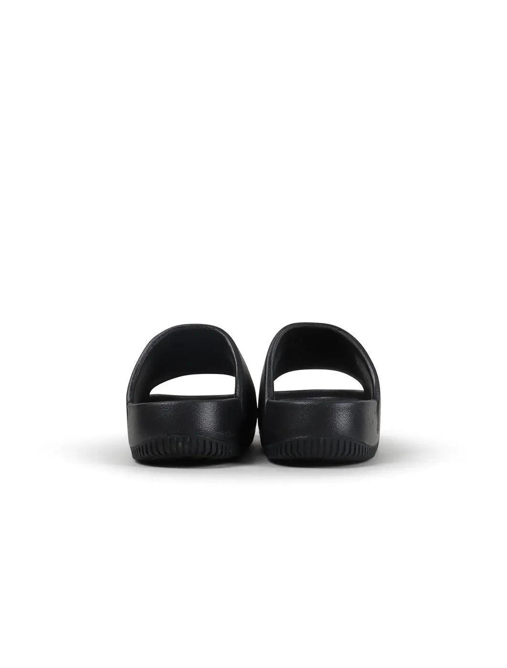 Women's Nike Calm Slide - Black - product image from the listing.