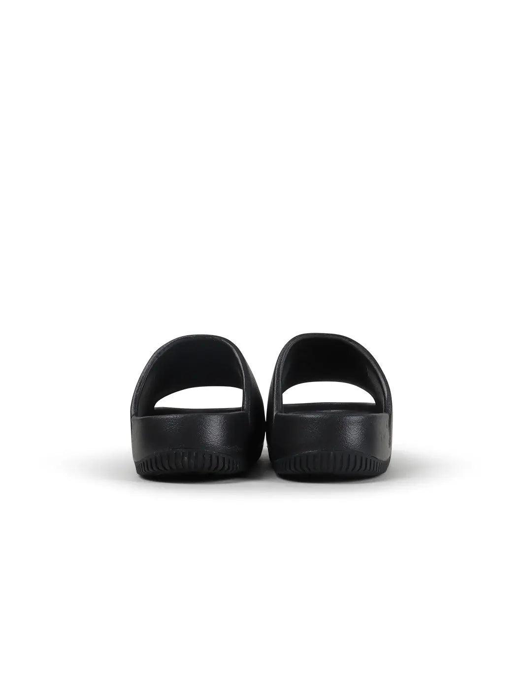 Women's Nike Calm Slide - Black - product image from the listing.