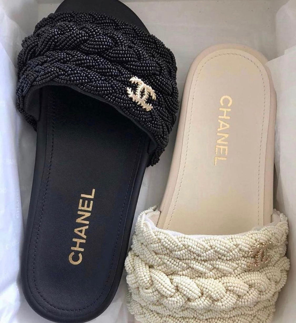 Chanel Pearl & Lambskin Woven Mule Slides in Black - product image from the listing.