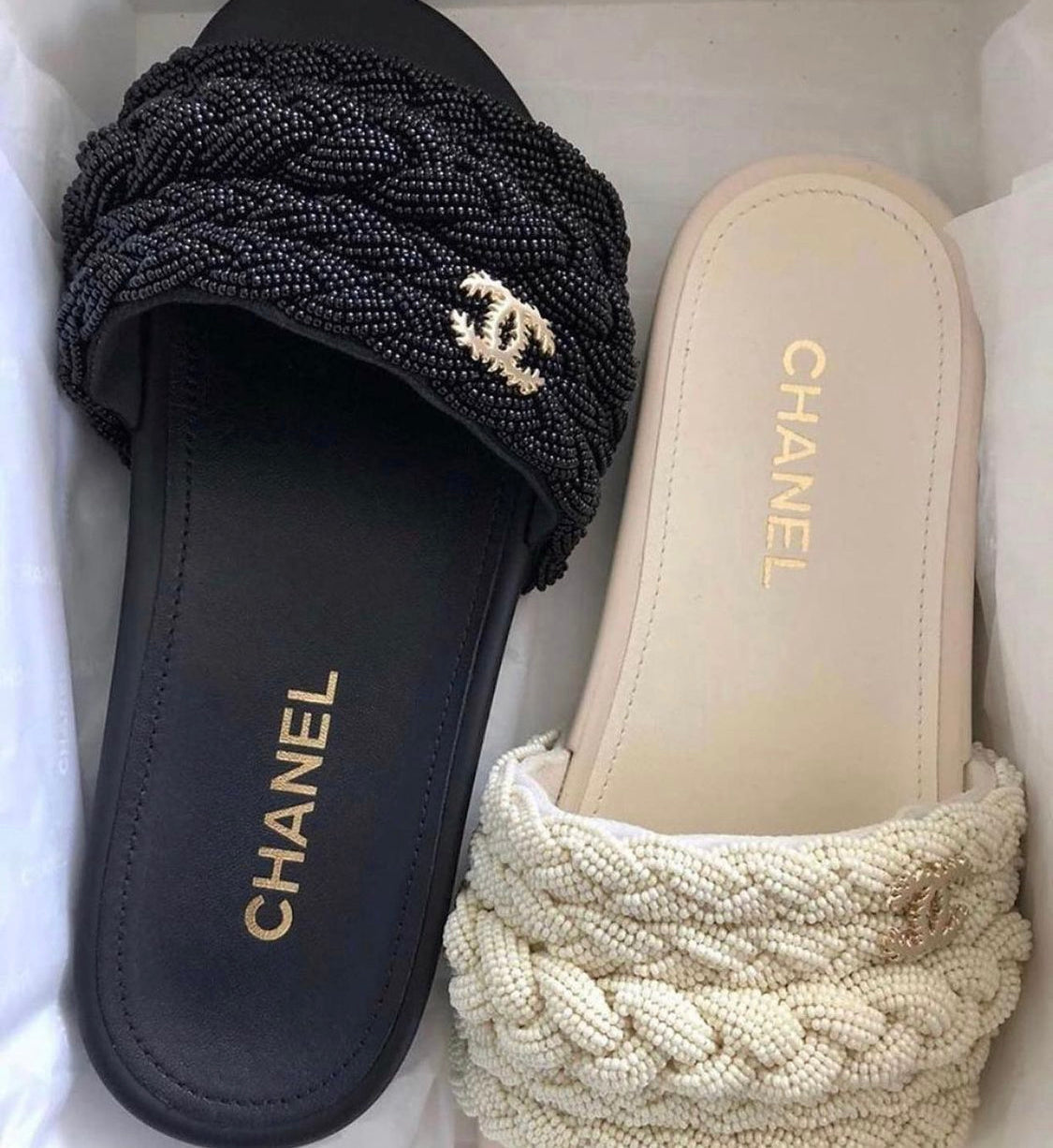 Chanel Pearl & Lambskin Woven Mule Slides in Black - product image from the listing.
