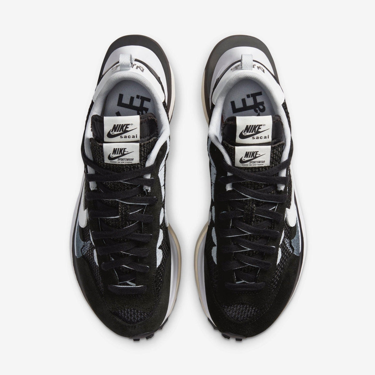 Nike sacai VaporWaffle CV1363-001 Sneakers in Black White - product image from the listing.