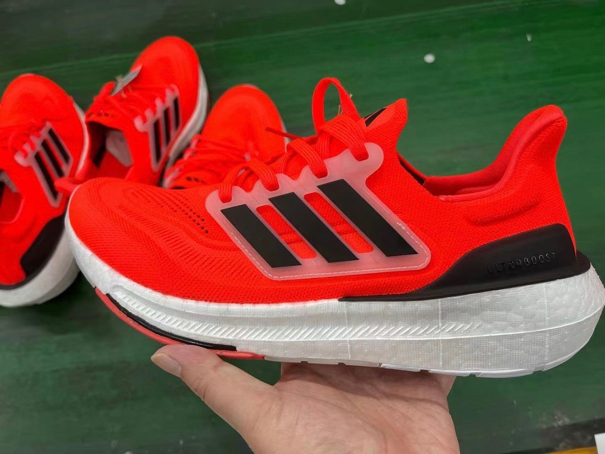 adidas Ultraboost 23 Running Shoes in Red Black HQ6341 - product image from the listing.