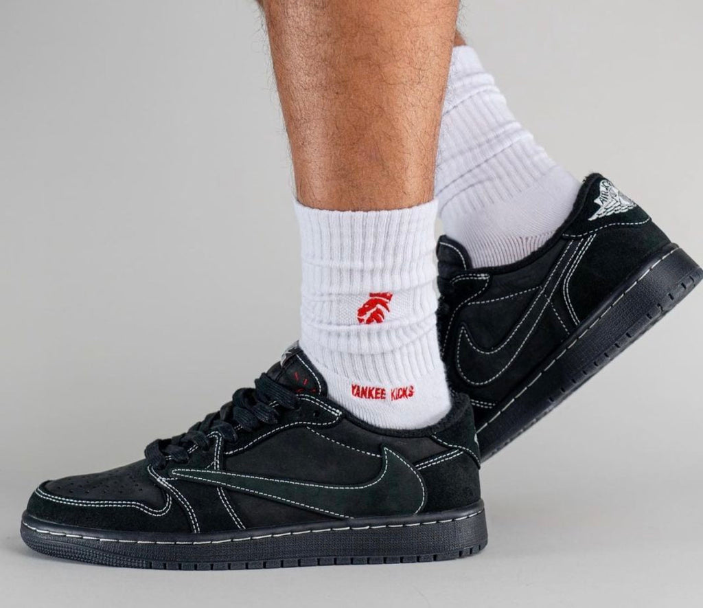 Jordan 1 Low OG Travis Scott Sneakers in Black DM7866-001 - product image from the listing.