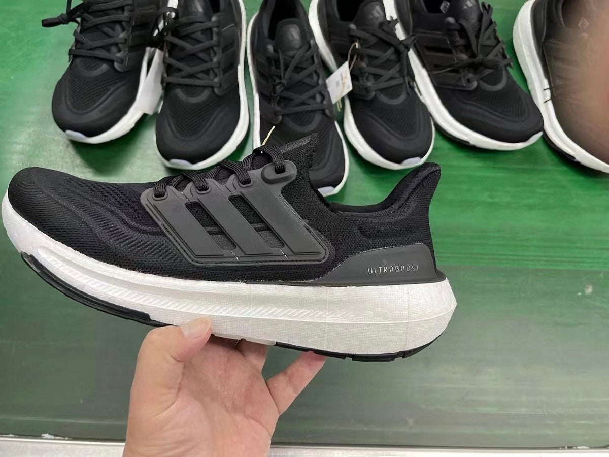 adidas Ultraboost 23 Light Running Shoes in Black White GY9351 - product image from the listing.