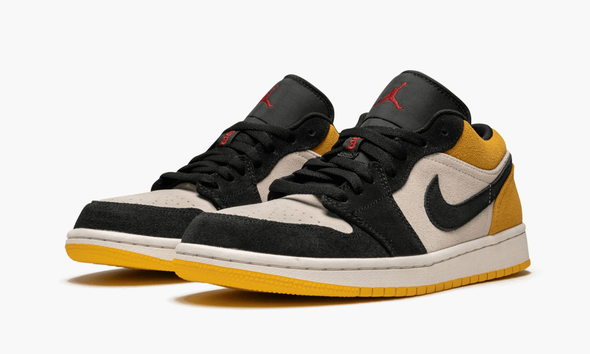 "University Gold" Air Jordan 1 Low - product image from the listing.