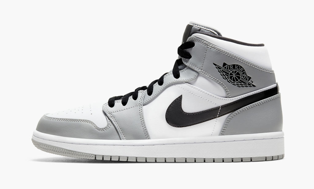 Air Jordan 1 Mid in Light Smoke Grey - product image from the listing.