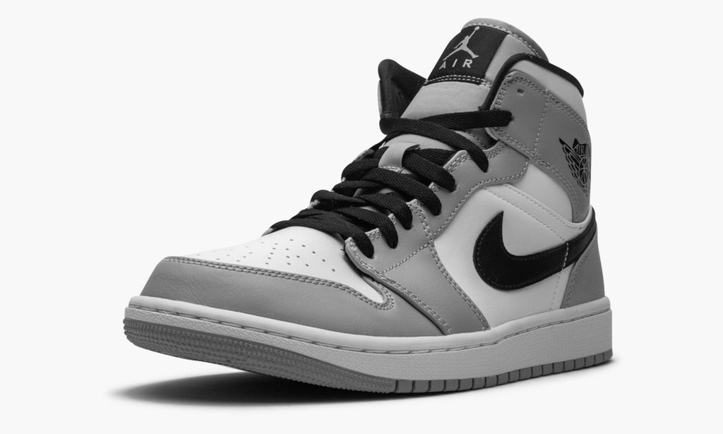Air Jordan 1 Mid in Light Smoke Grey - product image from the listing.