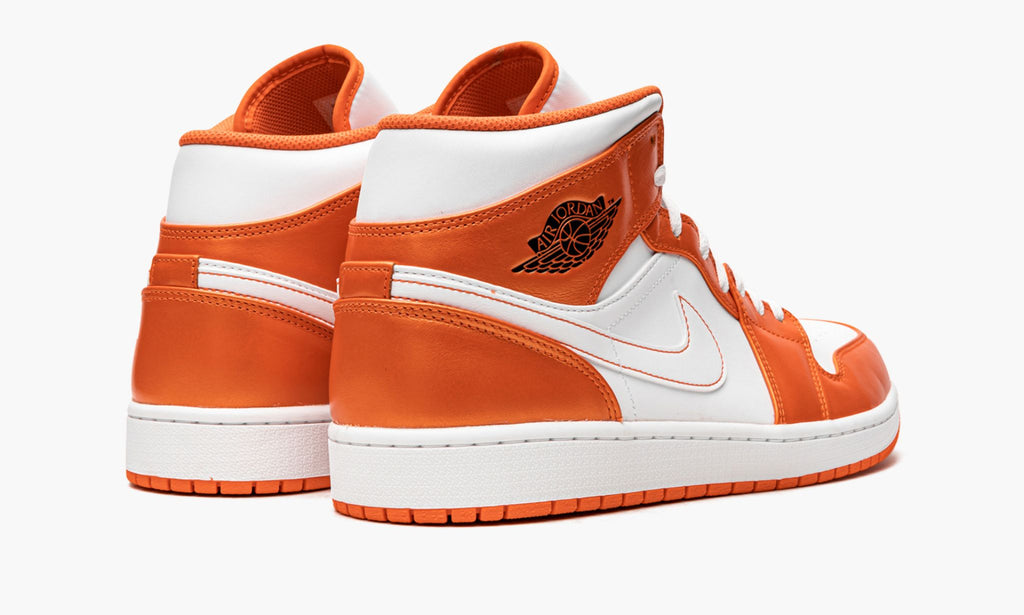 Air Jordan 1 Mid SE Electro in Orange - product image from the listing.