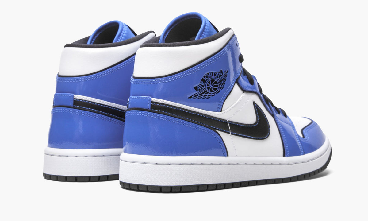 Air Jordan 1 Mid SE Signal in Blue - product image from the listing.