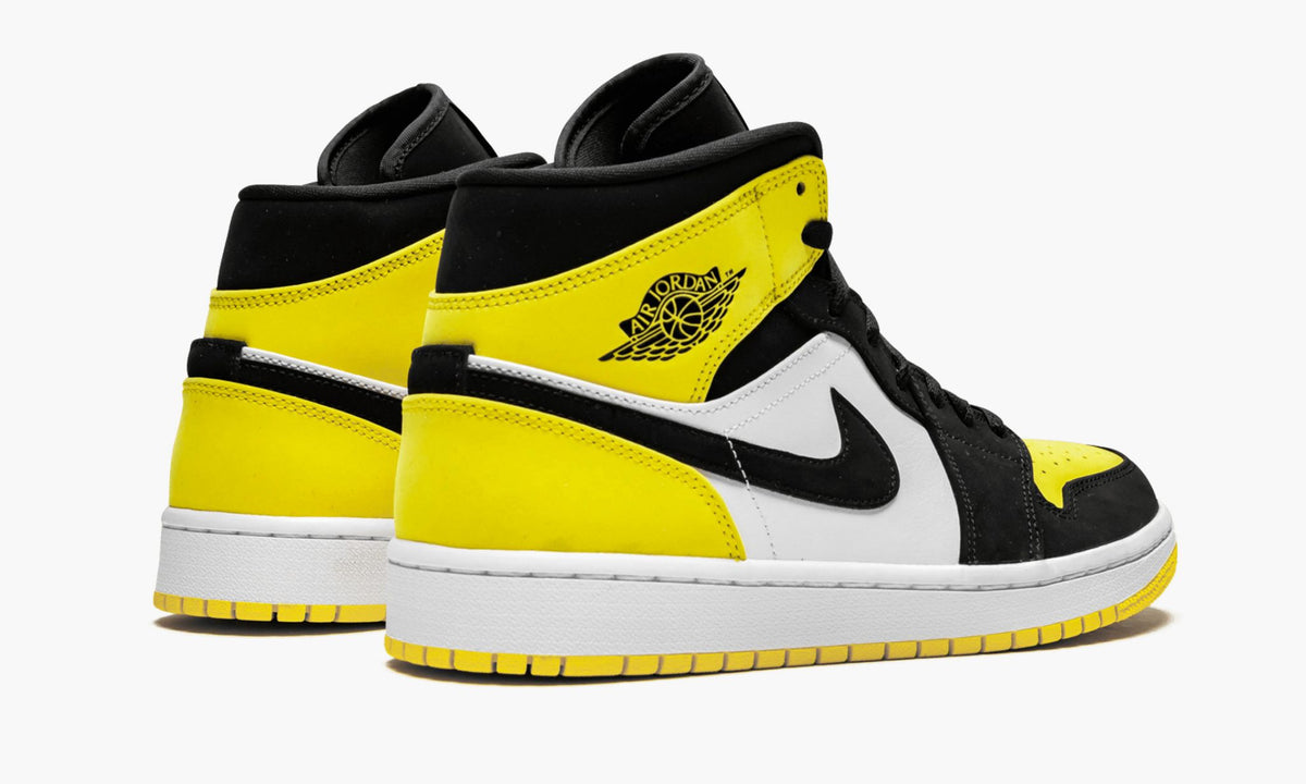 Yellow Toe - Air Jordan 1 MID SE - product image from the listing.