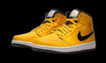 Air Jordan 1 Mid Taxi in Yellow - product image from the listing.