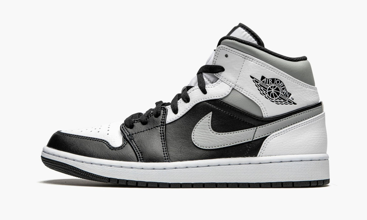 White Shadow - Air Jordan 1 Mid - product image from the listing.