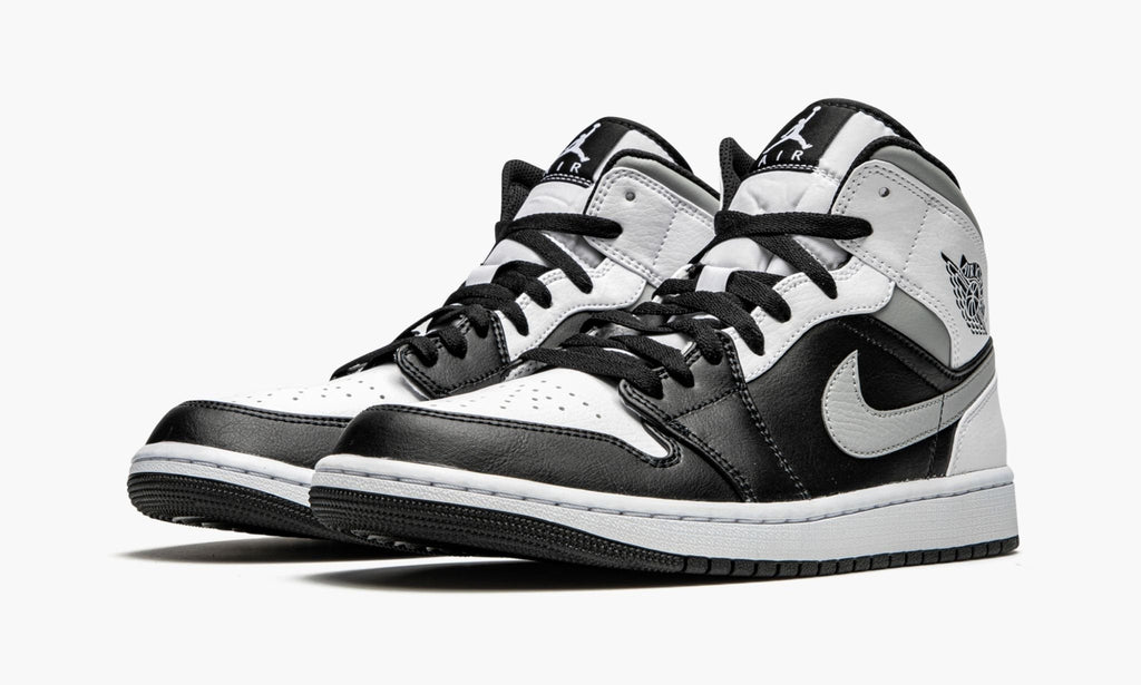White Shadow - Air Jordan 1 Mid - product image from the listing.