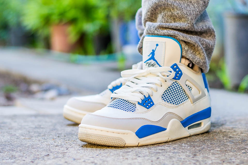 Military Blue - Air Jordan 4 Retro 2012 - product image from the listing.