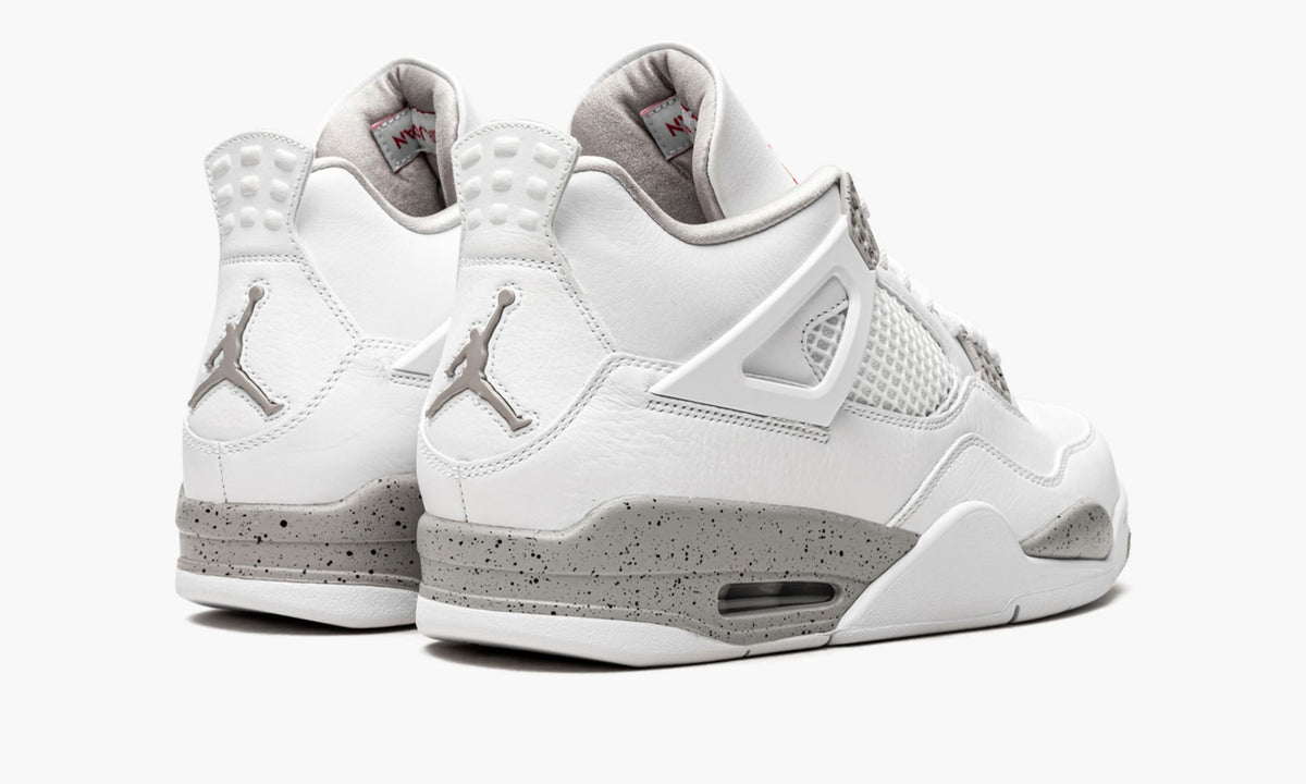 White Oreo - Air Jordan 4 Retro - product image from the listing.