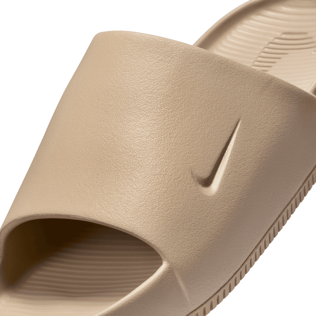 Calm Slide by Nike - product photo shown in the listing for this item.