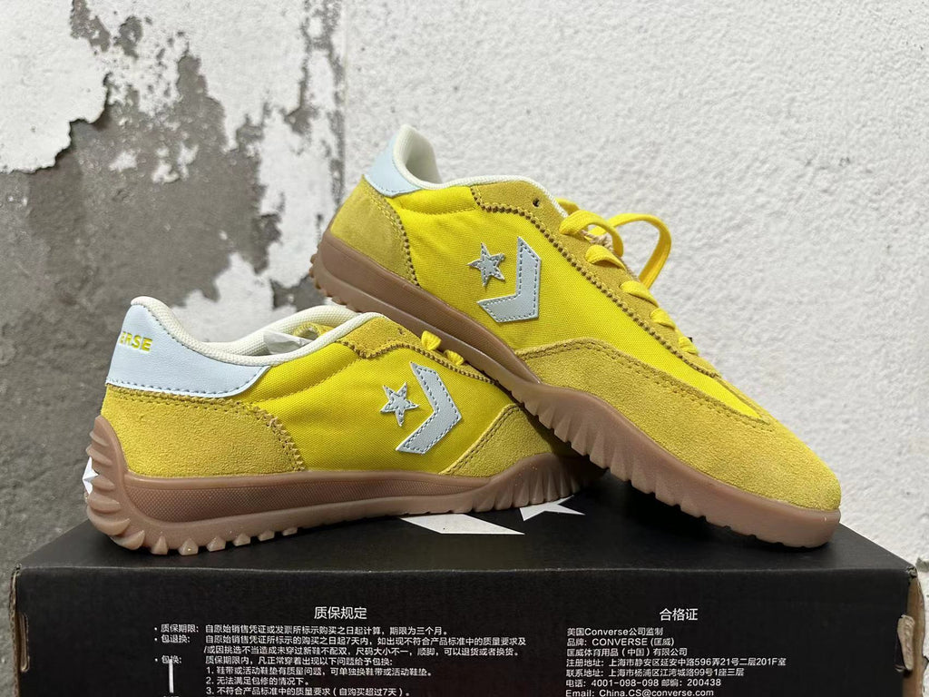 Yellow Converse Training Shoes - product image from the listing.