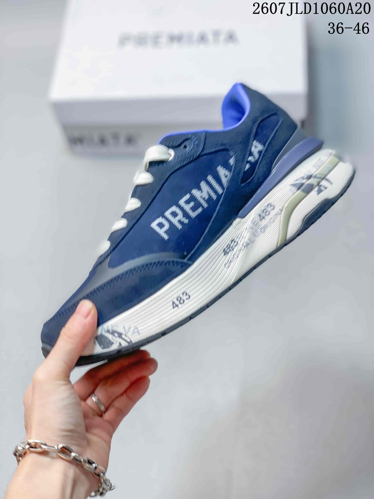 Premiata Lander Trainers in Navy White 712800TIT - product image from the listing.