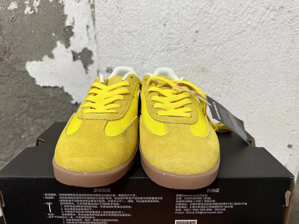 Yellow Converse Training Shoes - product image from the listing.