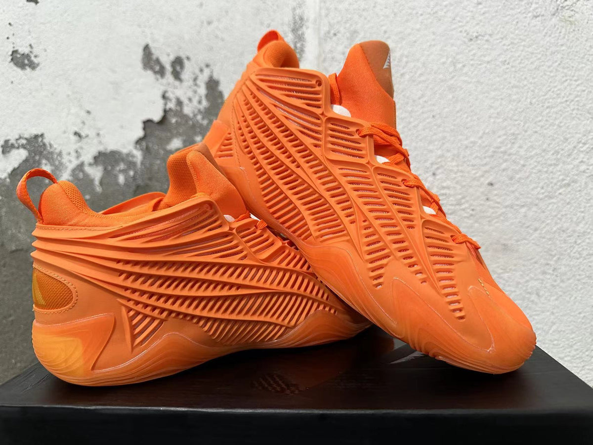 Orange Adidas Basketball Trainers - product image from the listing.