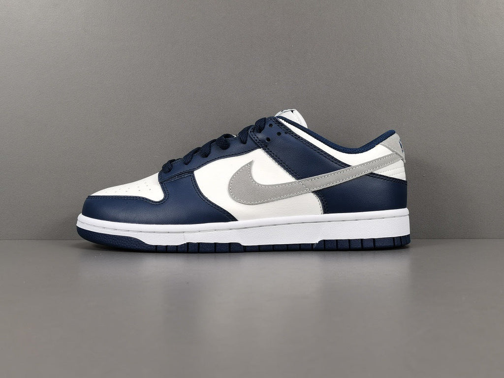 Nike Dunk Low Sneakers in Midnight Navy FD9749-400 - product image from the listing.