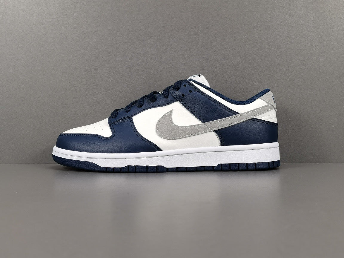Nike Dunk Low Sneakers in Midnight Navy FD9749-400 - product image from the listing.
