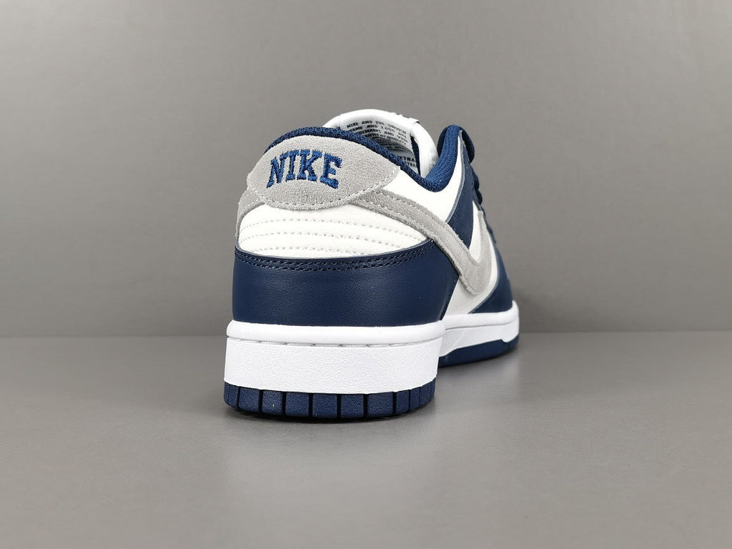 Nike Dunk Low Sneakers in Midnight Navy FD9749-400 - product image from the listing.