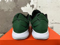 Green and White Nike Zoom Basketball Shoes - product image from the listing.