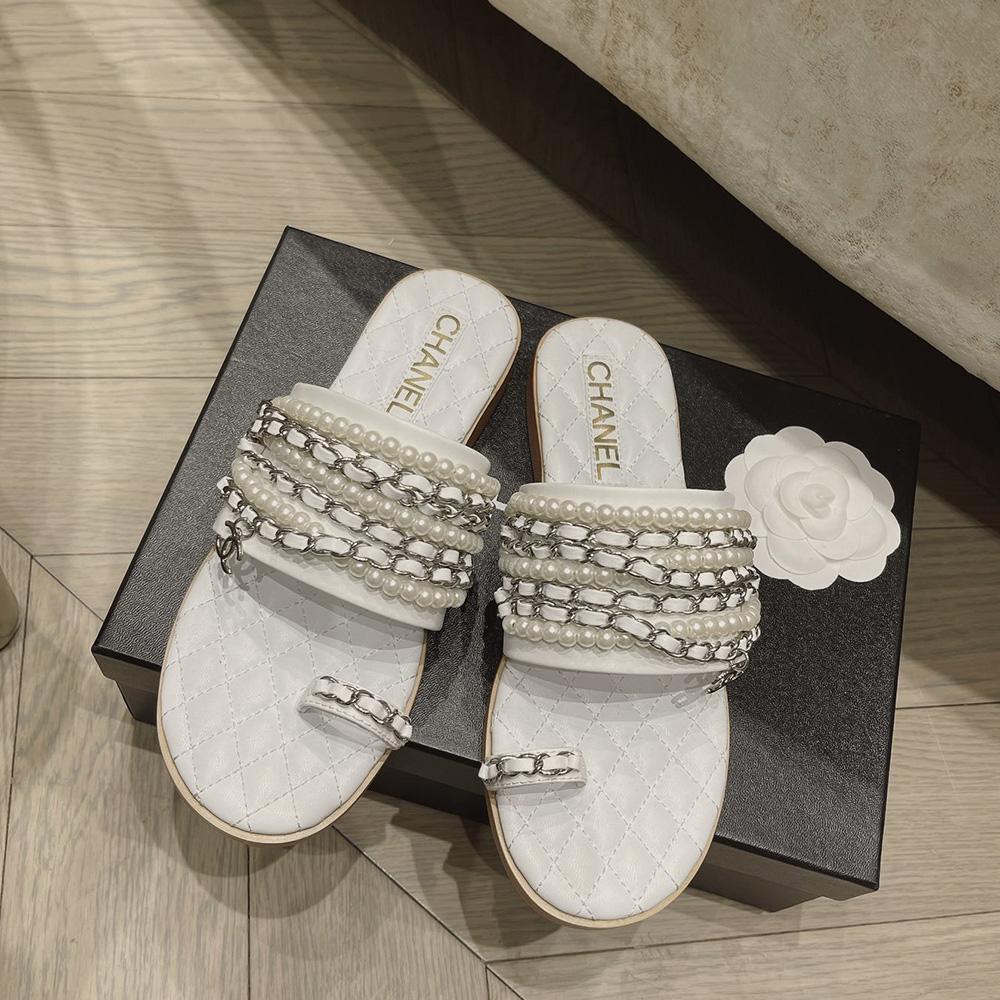 Sandals by Chanel - product photo shown in the listing for this item.