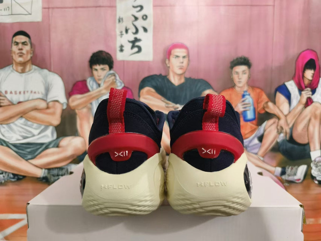 Nike Kyrie Low Basketball Shoes in Navy Red - product image from the listing.