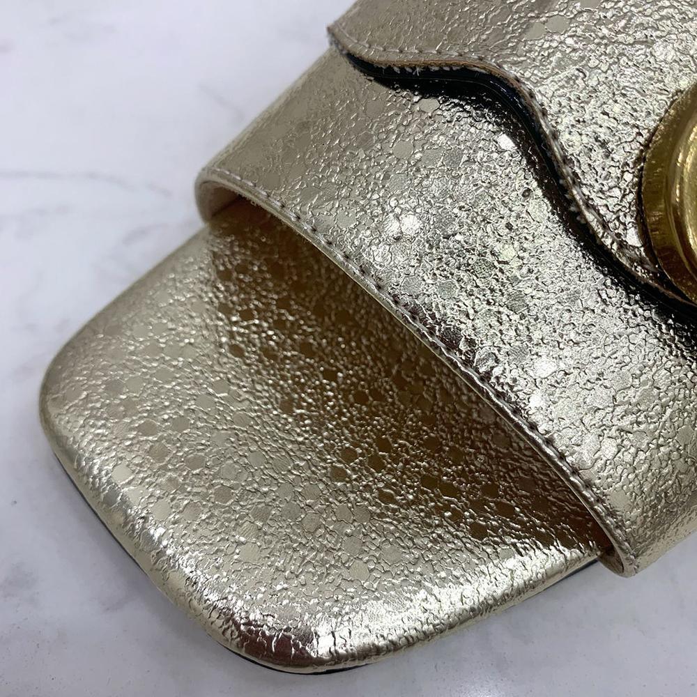 Sandals by Gucci - product photo shown in the listing for this item.