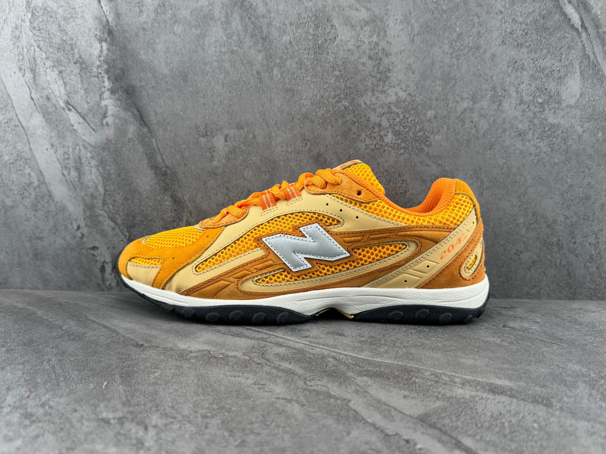 New Balance 204L Sneakers in Yellow and Brown - product image from the listing.