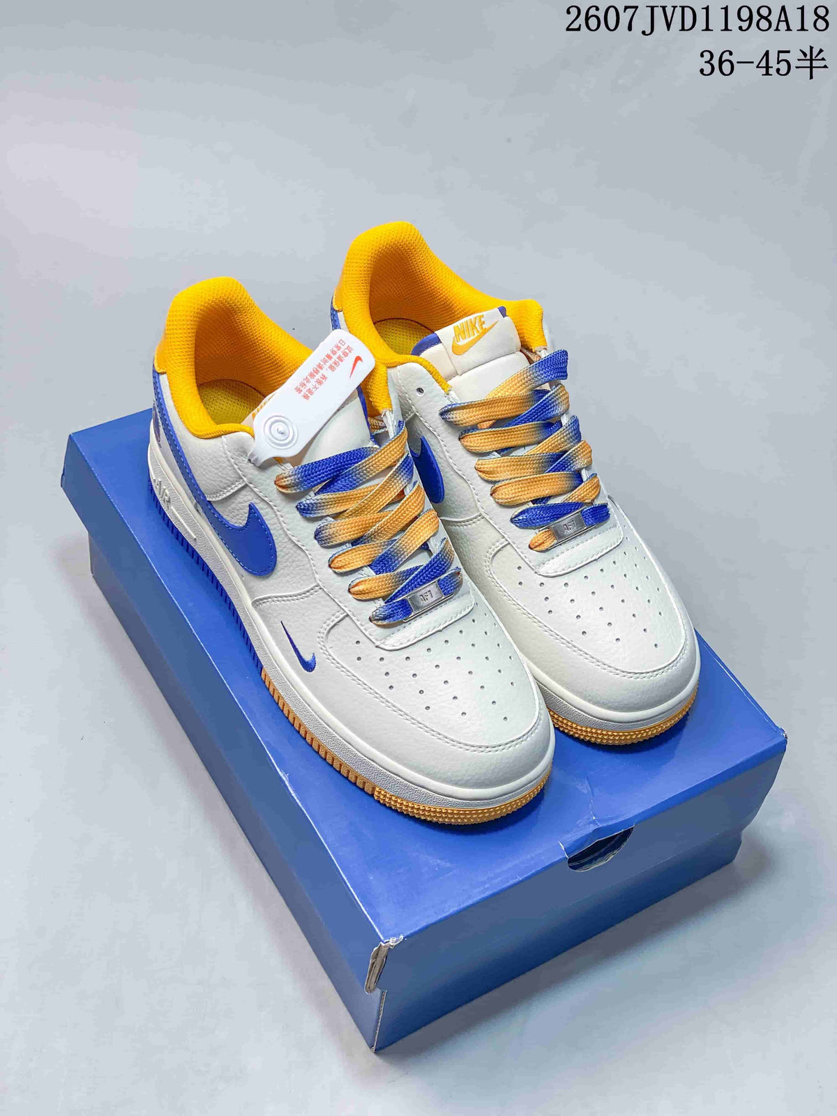 Nike Air Force 1 '07 Low Sneakers in White Blue Yellow - product image from the listing.