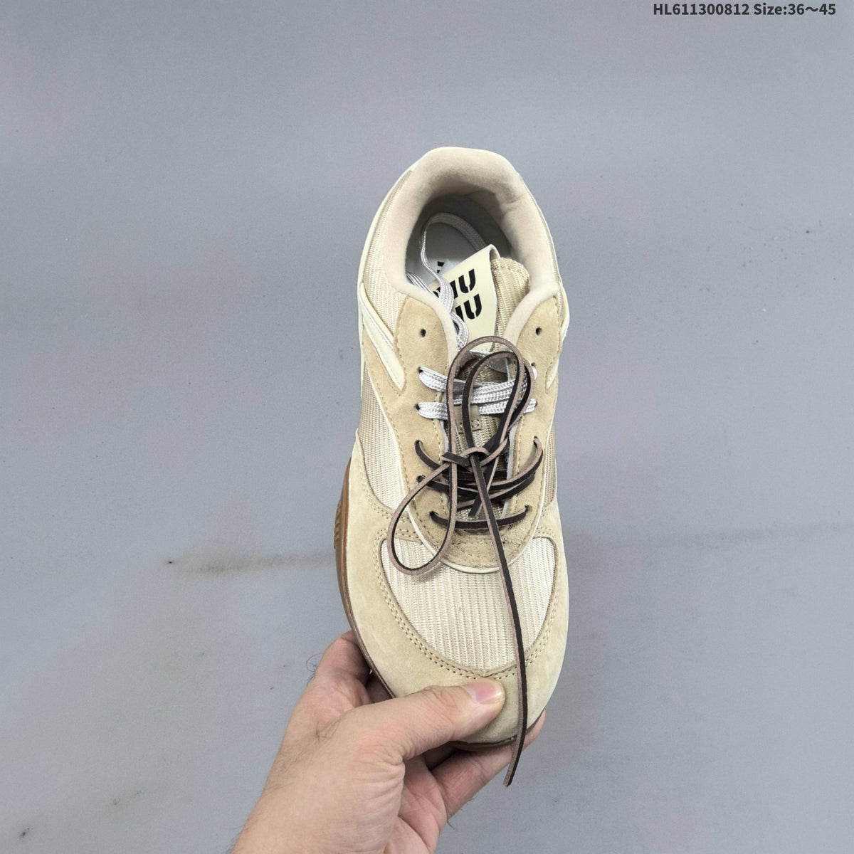 Miu Miu x New Balance 530 SL Low-Top Sneakers in Beige - product image from the listing.