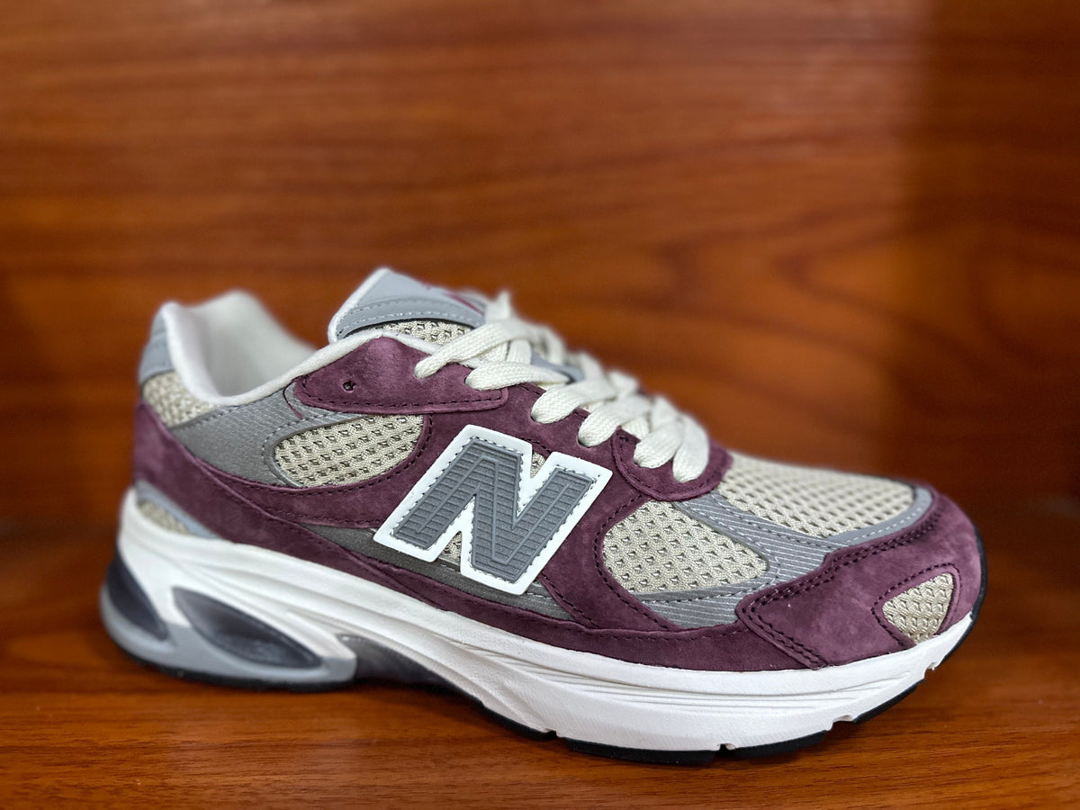 New Balance 9060 Sneakers in Burgundy and Grey - product image from the listing.
