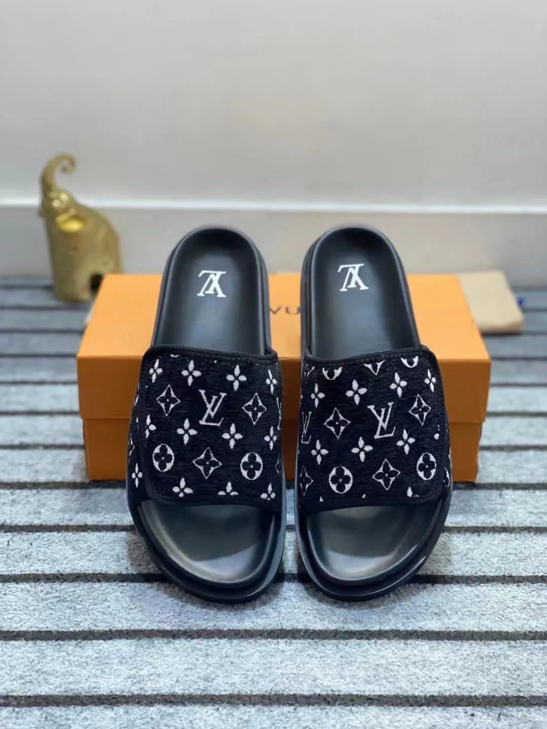 Monogram Logo Sandals by Louis Vuitton - product image from the listing.