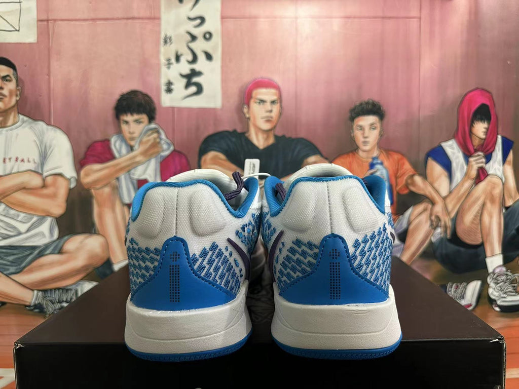 Nike Basketball Shoes in White and Blue - product image from the listing.