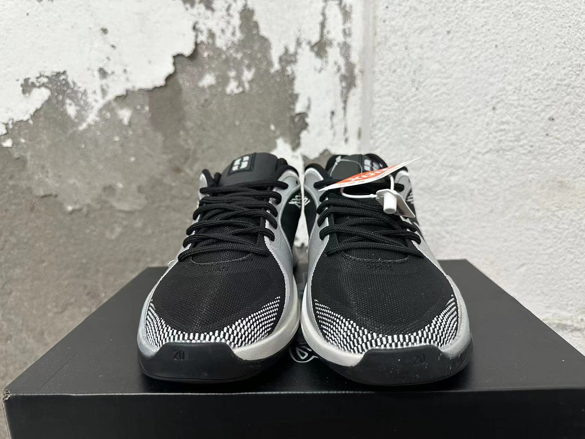 Nike Basketball Shoes in Black and Silver - product image from the listing.